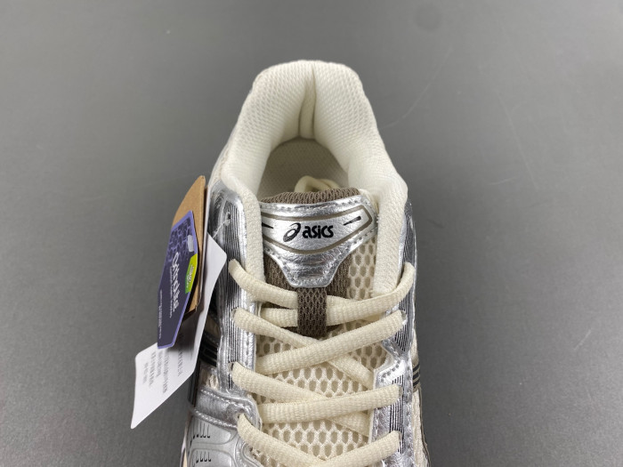As*ic*s sneaker